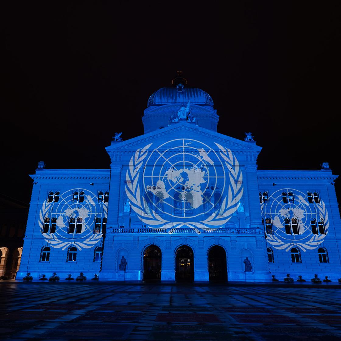 UN logo projection on the Federal Palace
