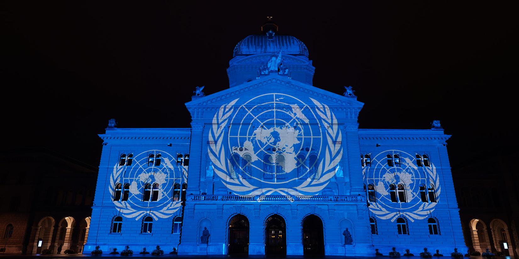 UN logo projection on the Federal Palace