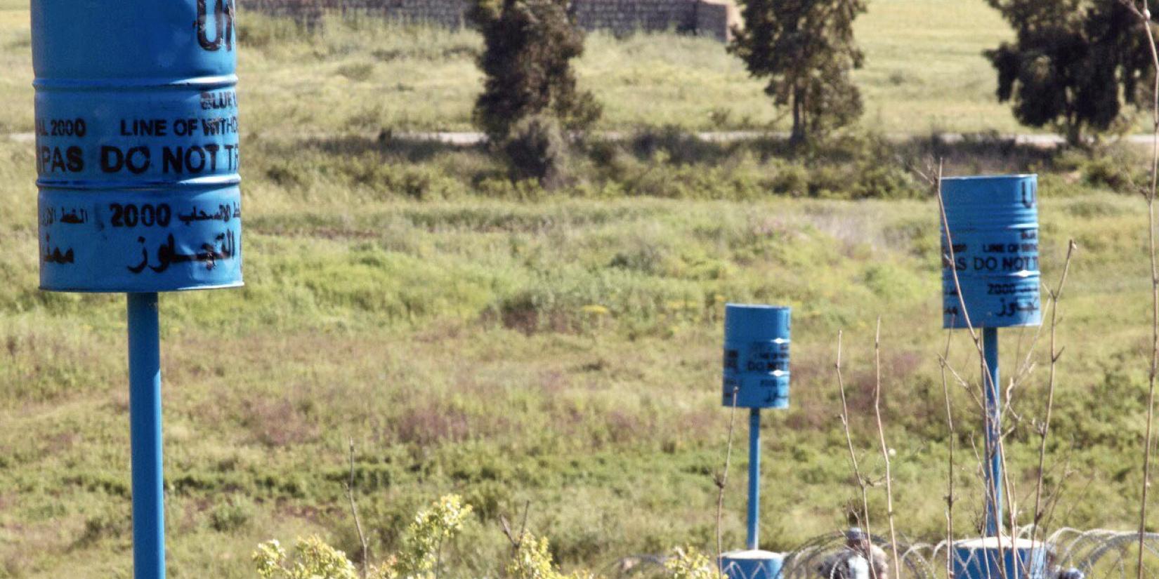 Blue coloured metal barrels mark the area along the Blue Line between Israel and Lebanon. ©UNIFIL
