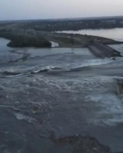 Huge masses of water flow through the breach in the Nova Kakhovka dam in Ukraine.
